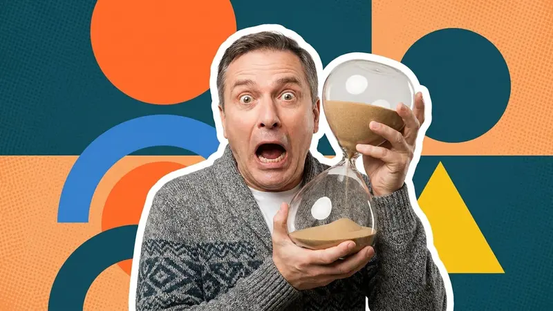 A wide-eyed man clutching a large hourglass and staring at the sand running through it
